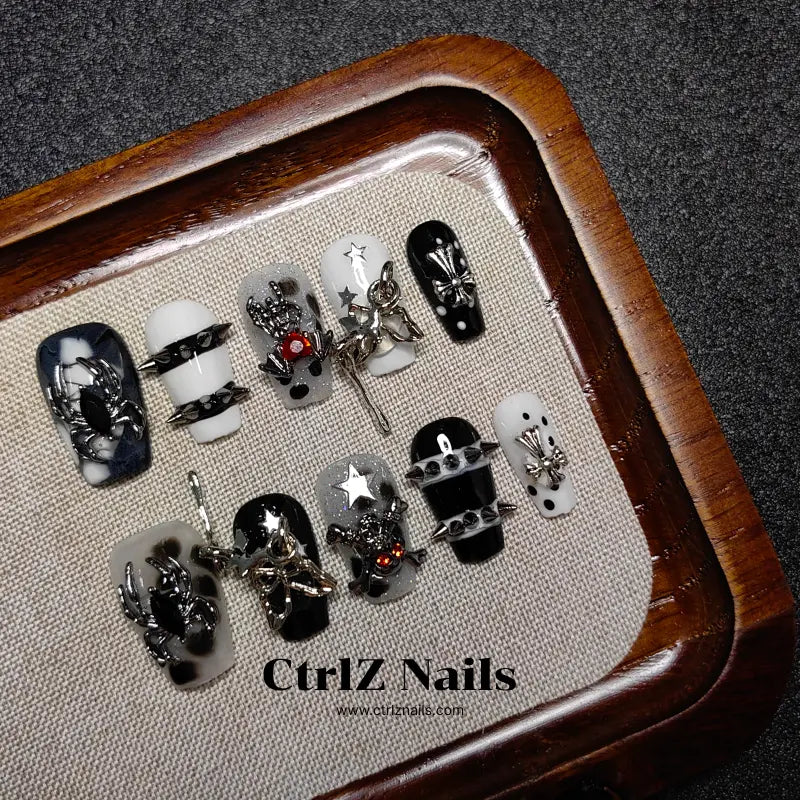 Dark punk press on nails with spider and edgy aesthetic