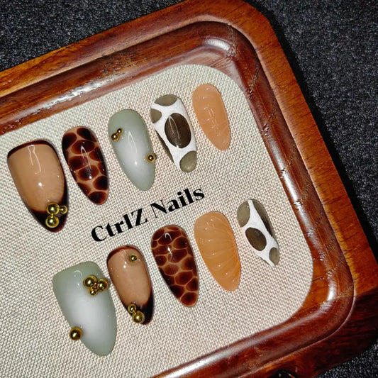 Luxe Leopard press on nails with elegant handmade leopard details