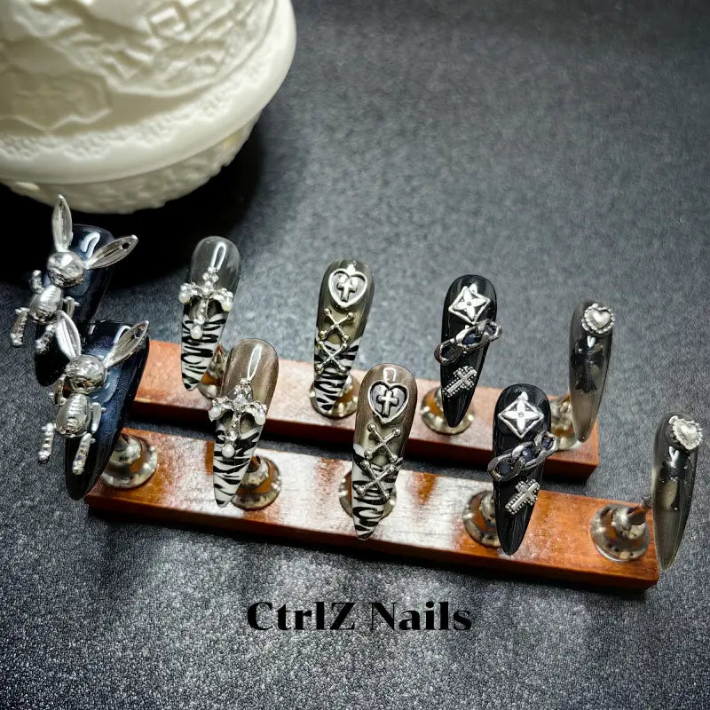 edgy sweet grunge manicure set featuring bunny charm and dark finish