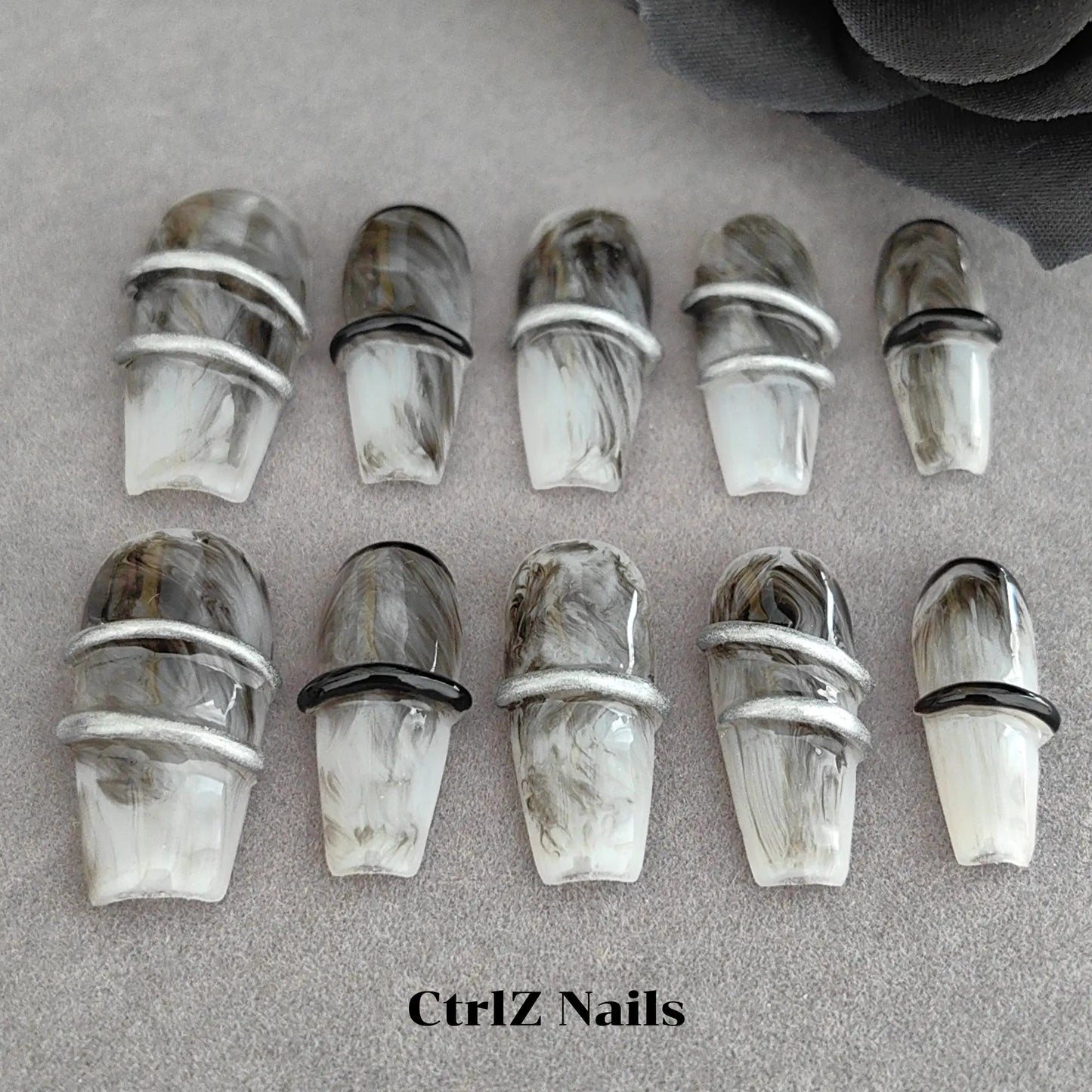 Close-Up of Dark Gothic Medium Coffin Press On Nails featuring Hand-Painted Smoke and Vine Artwork
