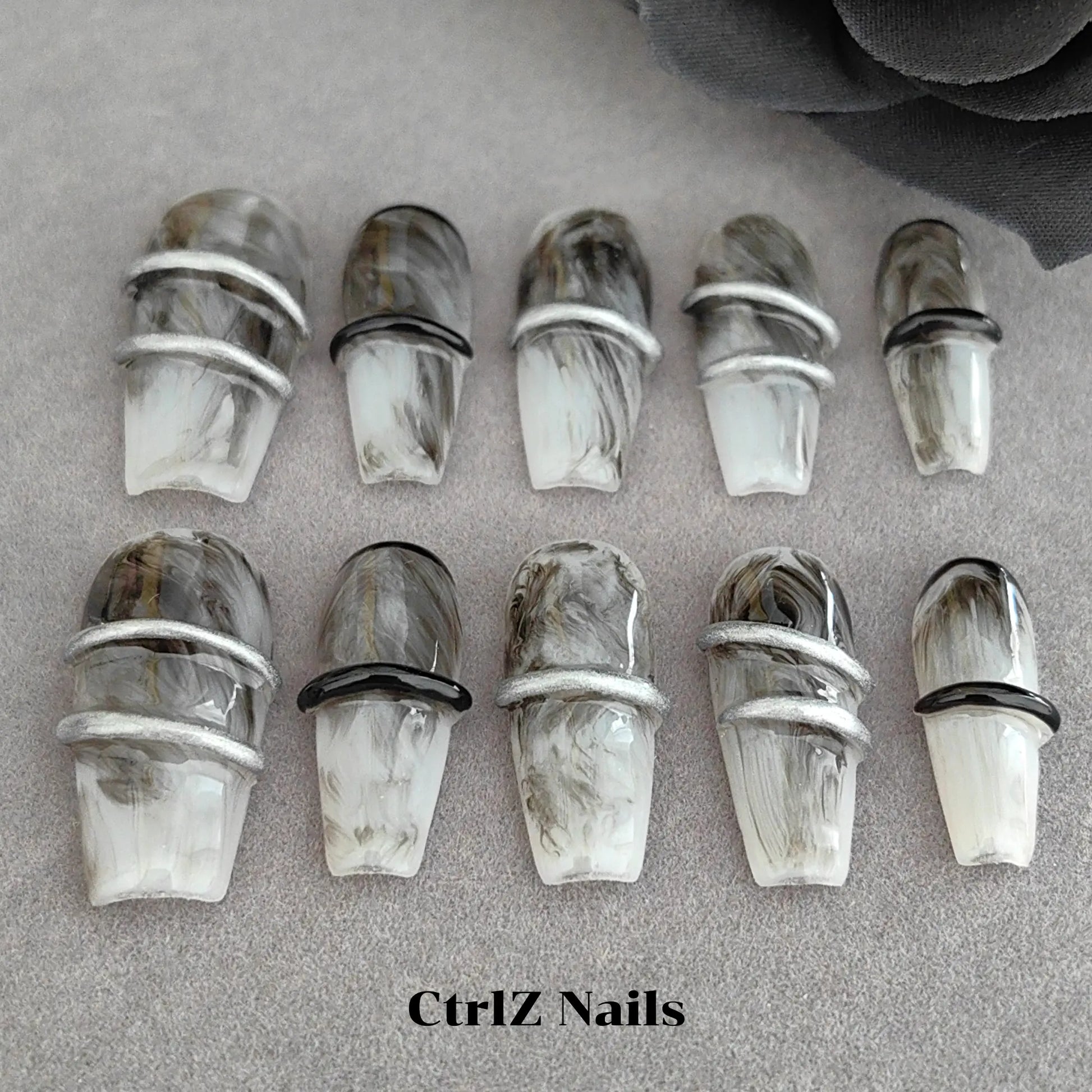 Close-Up of Dark Gothic Medium Coffin Press On Nails featuring Hand-Painted Smoke and Vine Artwork

