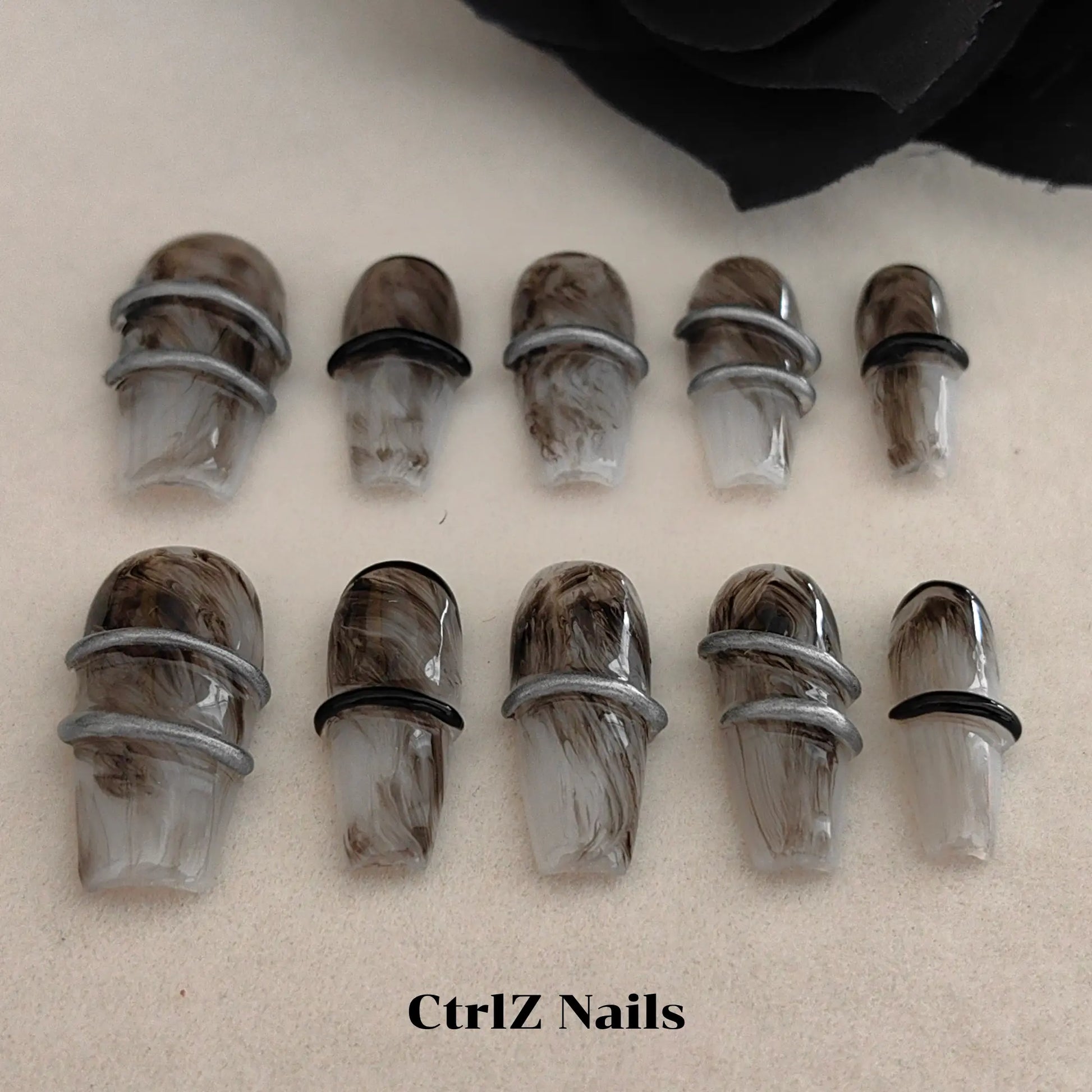 High-Detail View of Handmade Medium Coffin Fake Nails Dark Gothic Smoke and Ink Wash Artwork

