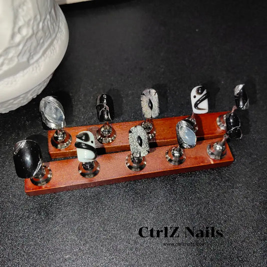 Evil Eye Charm press on nails with striking dark accents